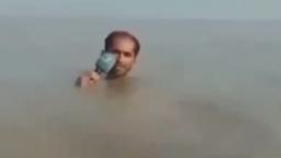 arabic reporter in water