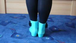 Jana shows her glow in the dark shiny rubber booties turquoise with black loop