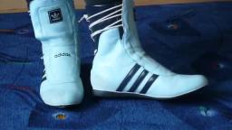 Jana shows her Adidas High Tops light blue black