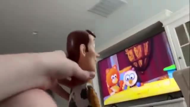 Woody watches Timmy Time